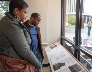 Look beyond the windows exhibit. Tobacco Warehouses, NC Mutual, Hill Building, Durham Arts Council